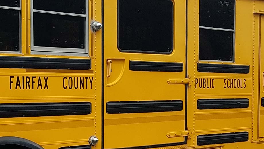 Side of school bus with "Fairfax County Public Schools" in letters