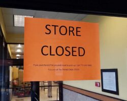 "Store Closed" sign on door to Shoppers