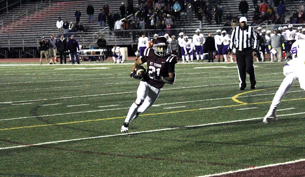 Reid by himself running toward goal line