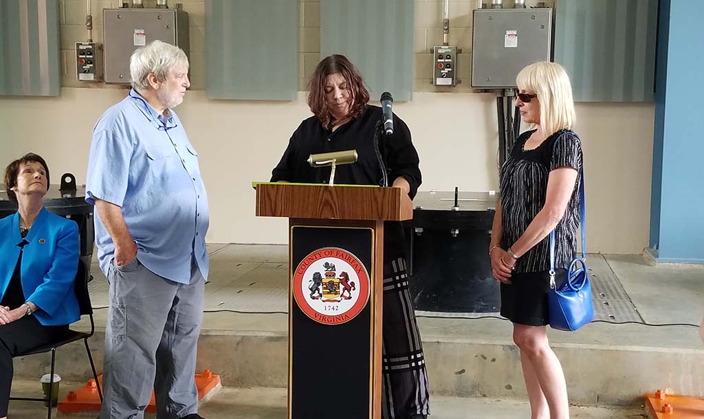 Resident making presentation at podium