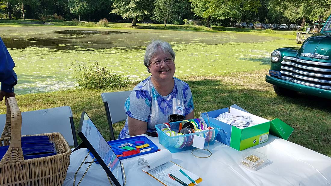 Baker sitting at table