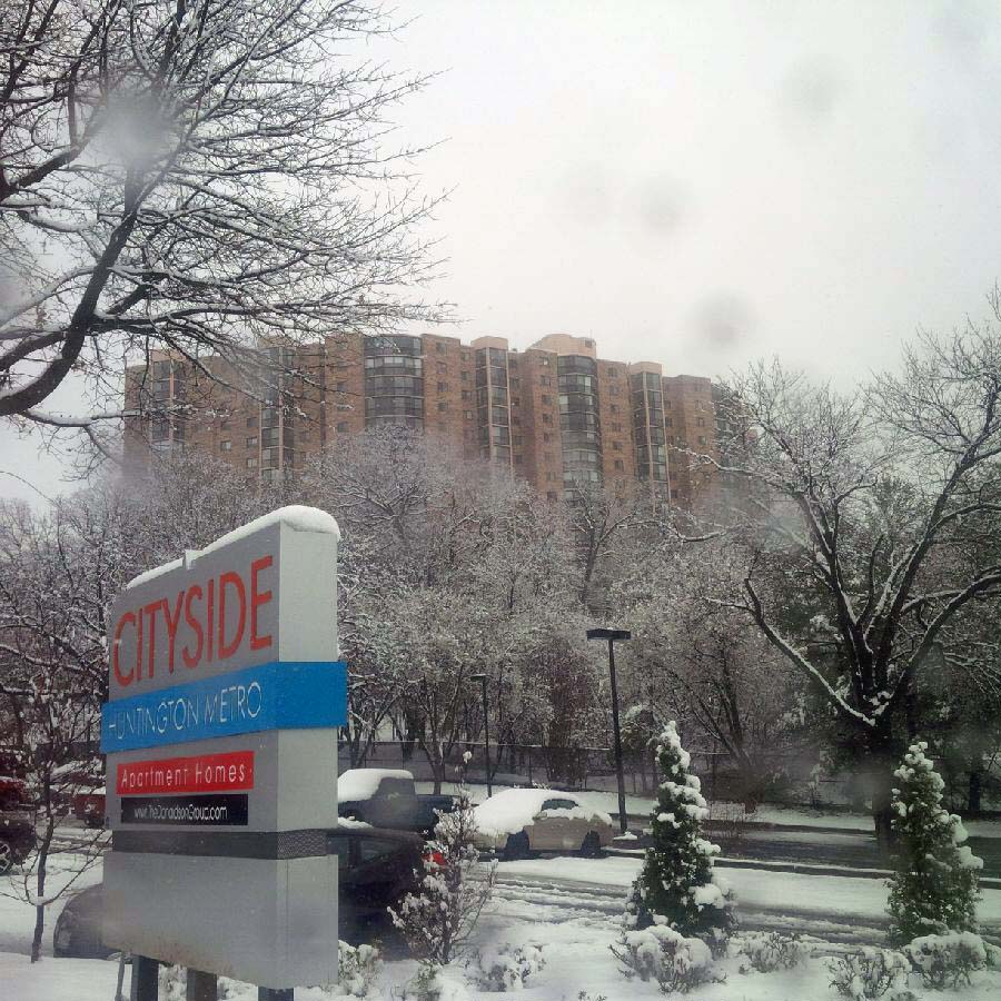 Cityside at Huntington Metro sign in front of apartment building.