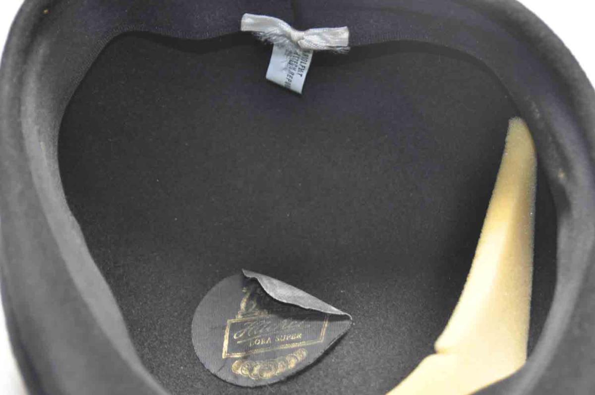 Inside of hat with label showing