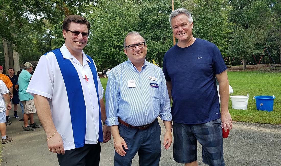 Trio posing for picture