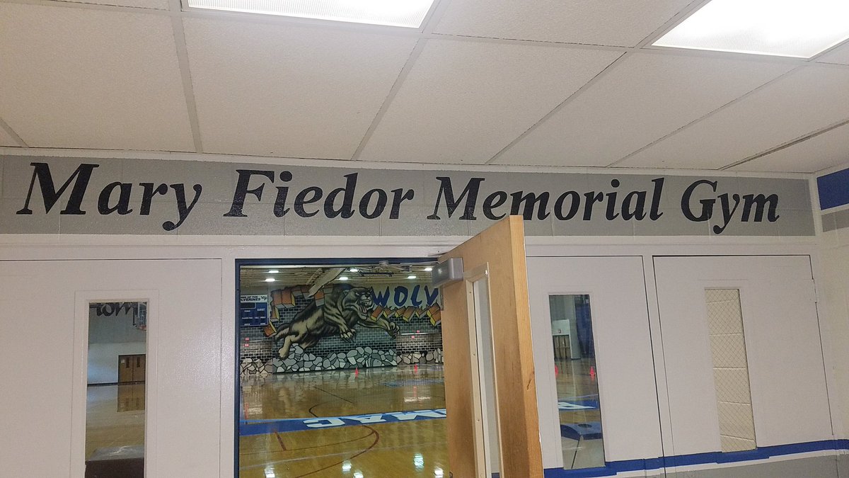 Mary Fiedor Memorial Gym painted above doorway