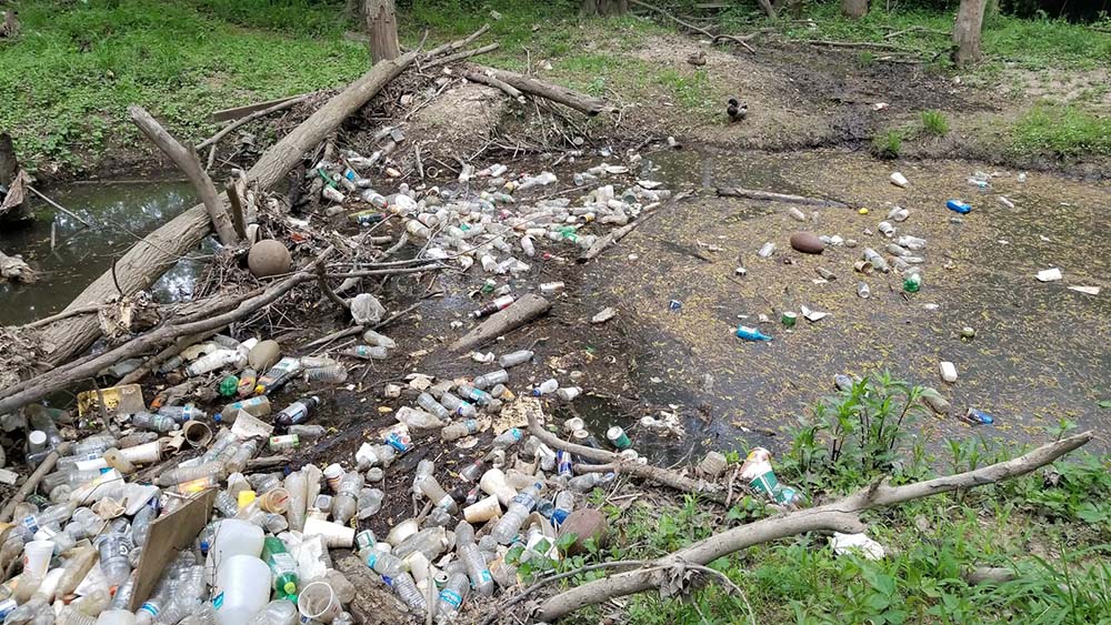 Pile of trash in stream